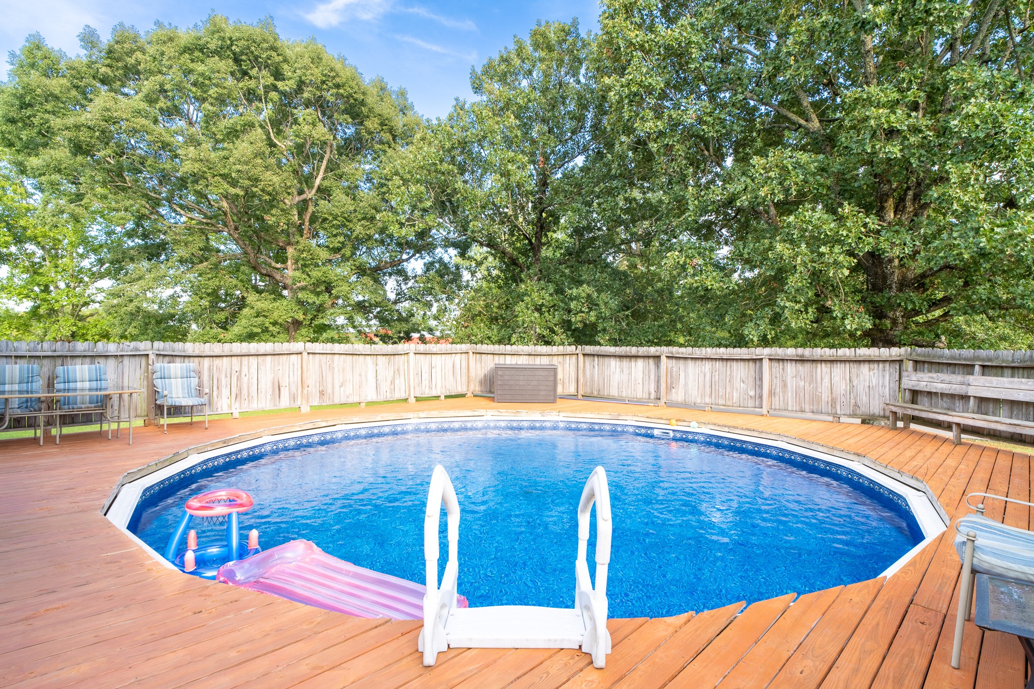 853 Prosser Road Leoma, TN 38468 - Photo 14 of 29 a view of a swimming pool with a lounge chair