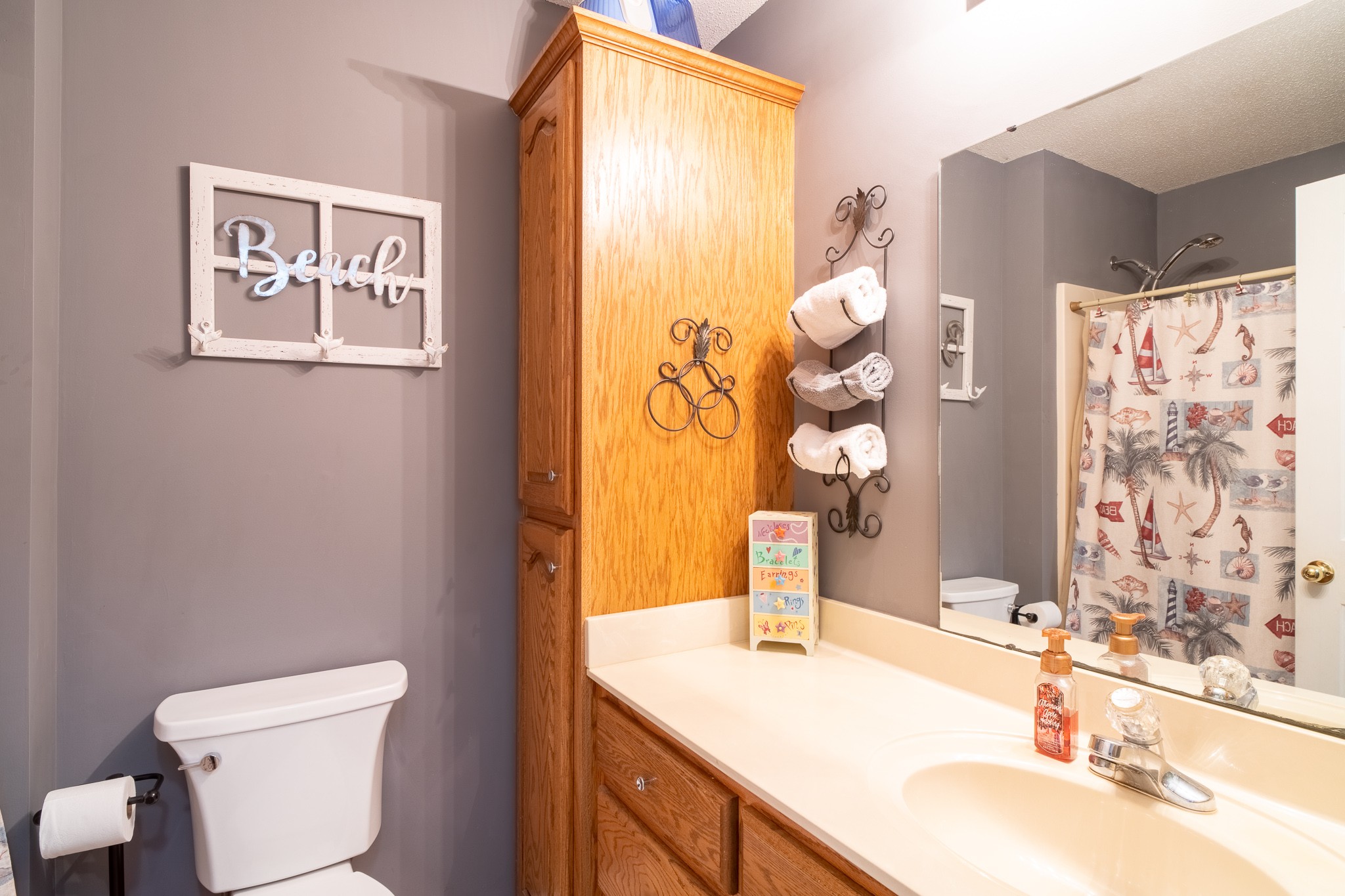 853 Prosser Road Leoma, TN 38468 - Photo 24 of 29 a bathroom with a granite countertop sink mirror vanity and toilet