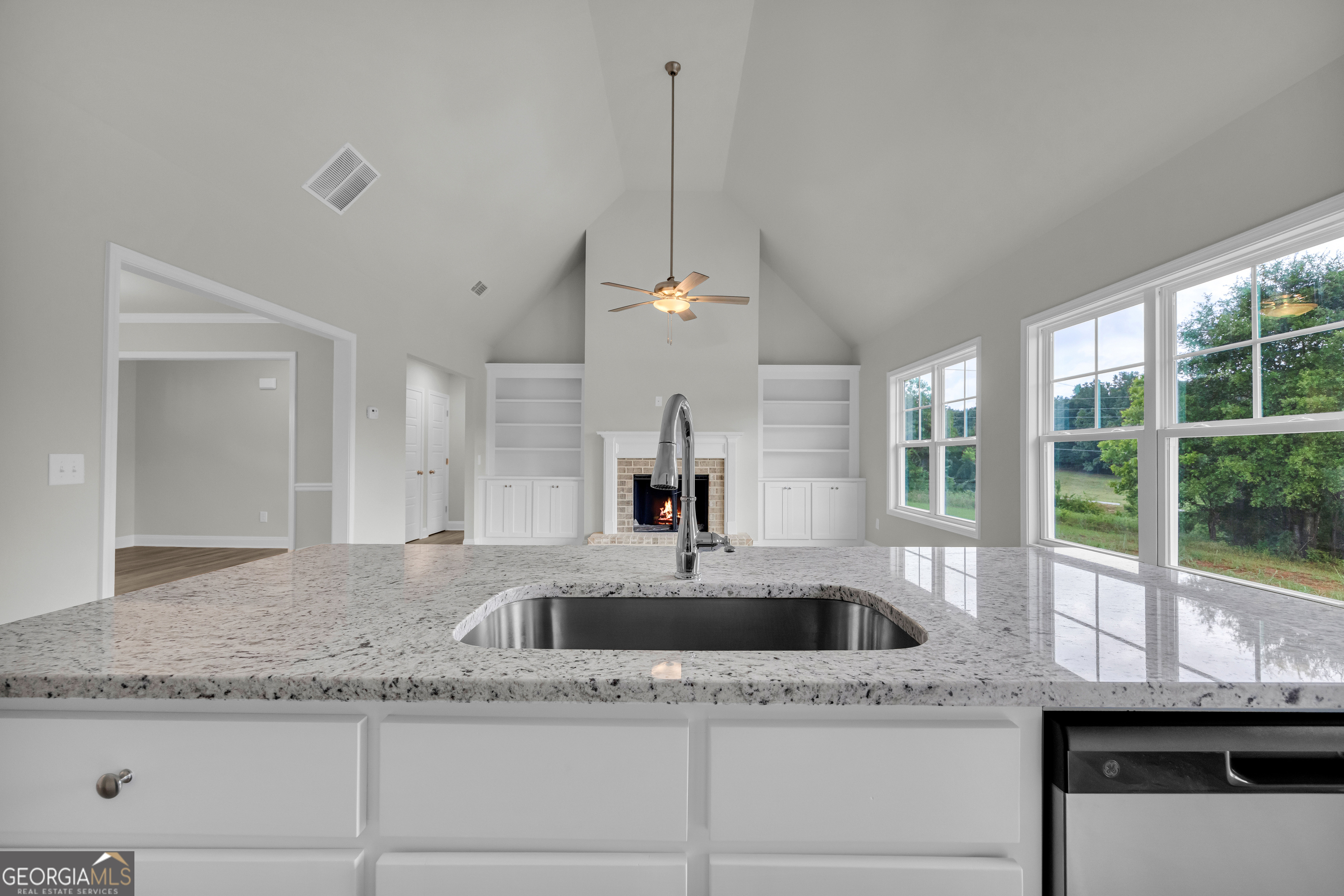 110 Sewell Road Lavonia, GA 30553 - Photo 38 of 73 a kitchen with granite countertop a sink and window