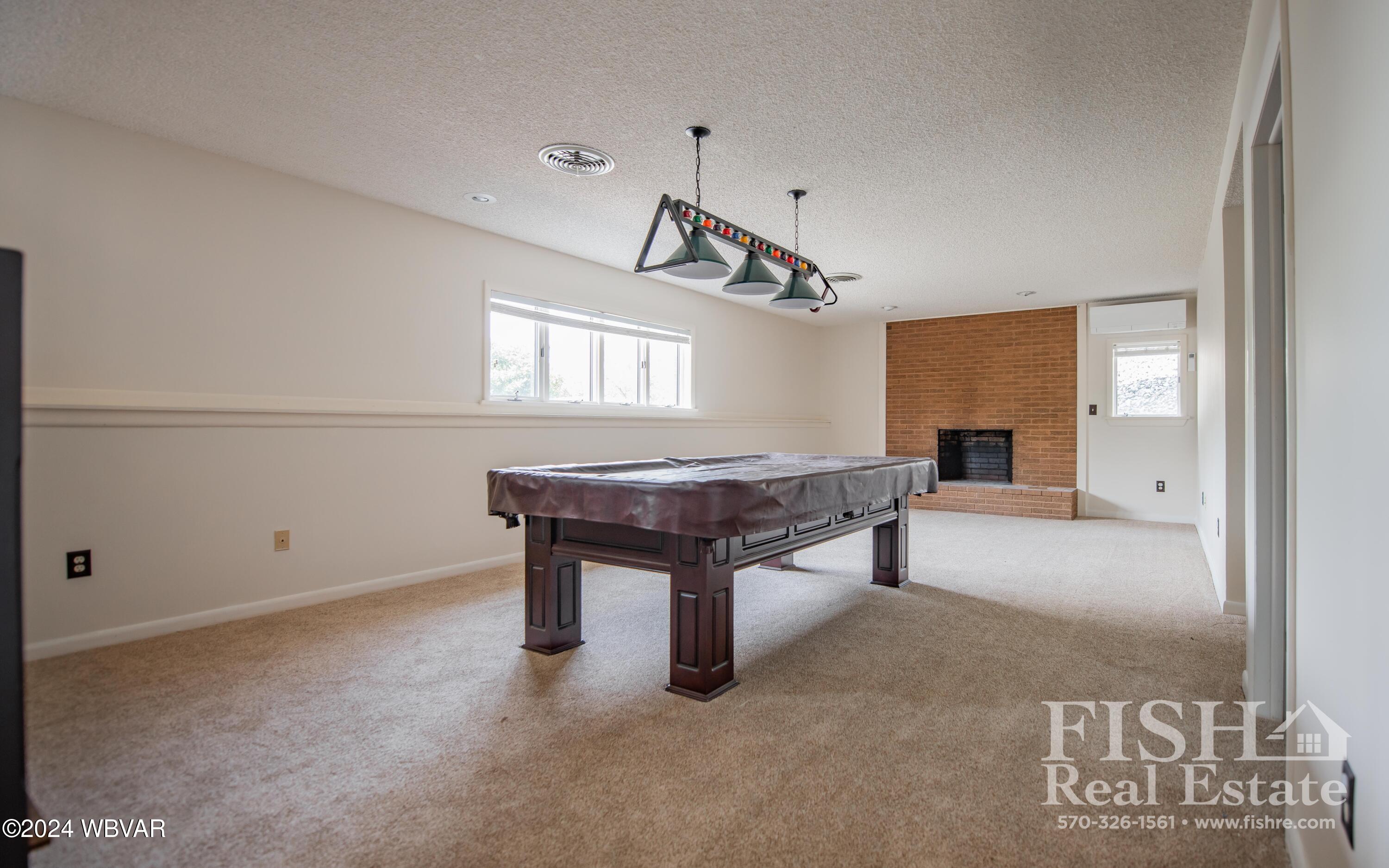 1705 Thomas Road Williamsport, PA 17701 - Photo 15 of 18 Lots of light and plenty of space and another Fireplace!