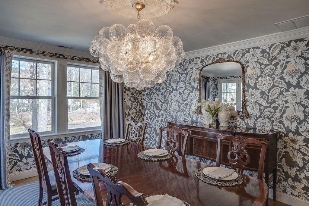 6 Phaeton Circle Andover, MA 01810 - Photo 19 of 42 a view of a dining room with furniture wooden floor and chandelier