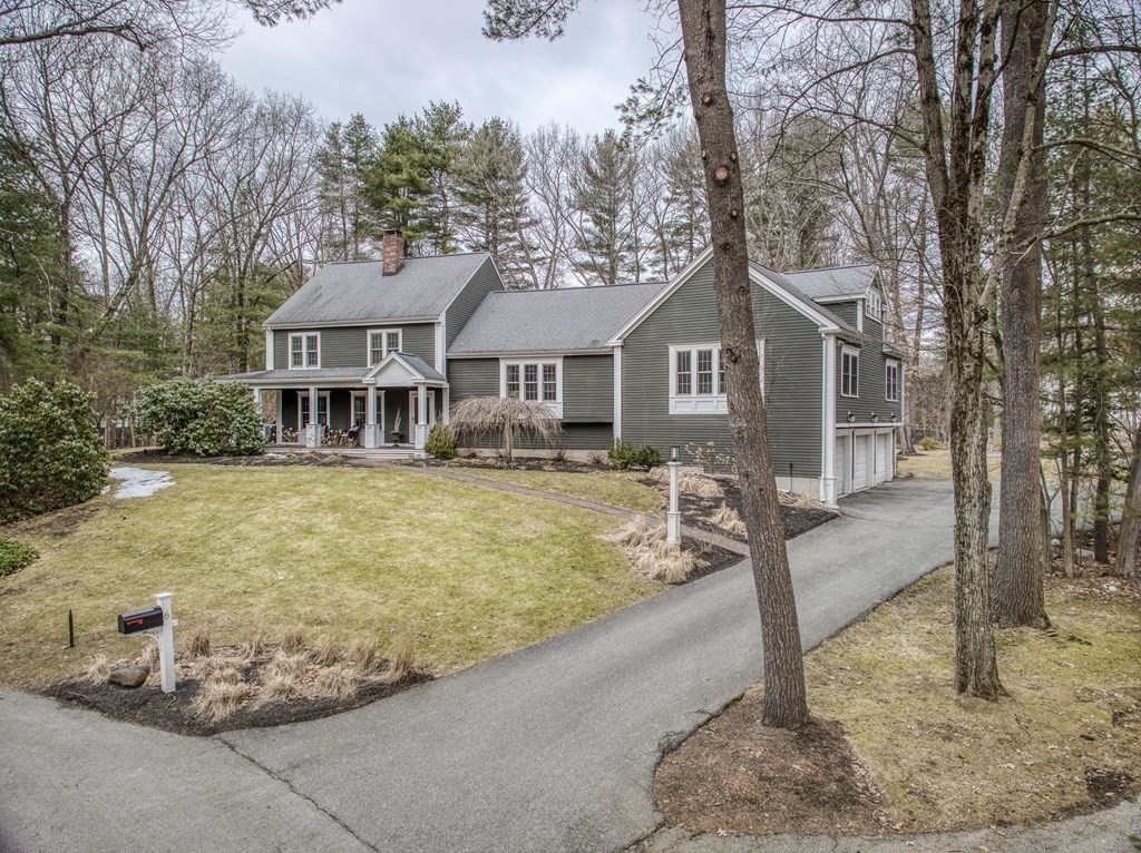 6 Phaeton Circle Andover, MA 01810 - Photo 2 of 42 a front view of a house with garden