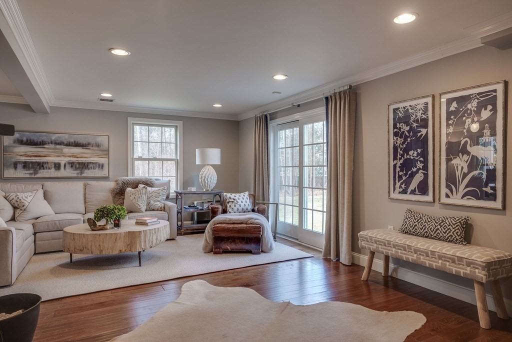 6 Phaeton Circle Andover, MA 01810 - Photo 22 of 42 a living room with furniture and a large window