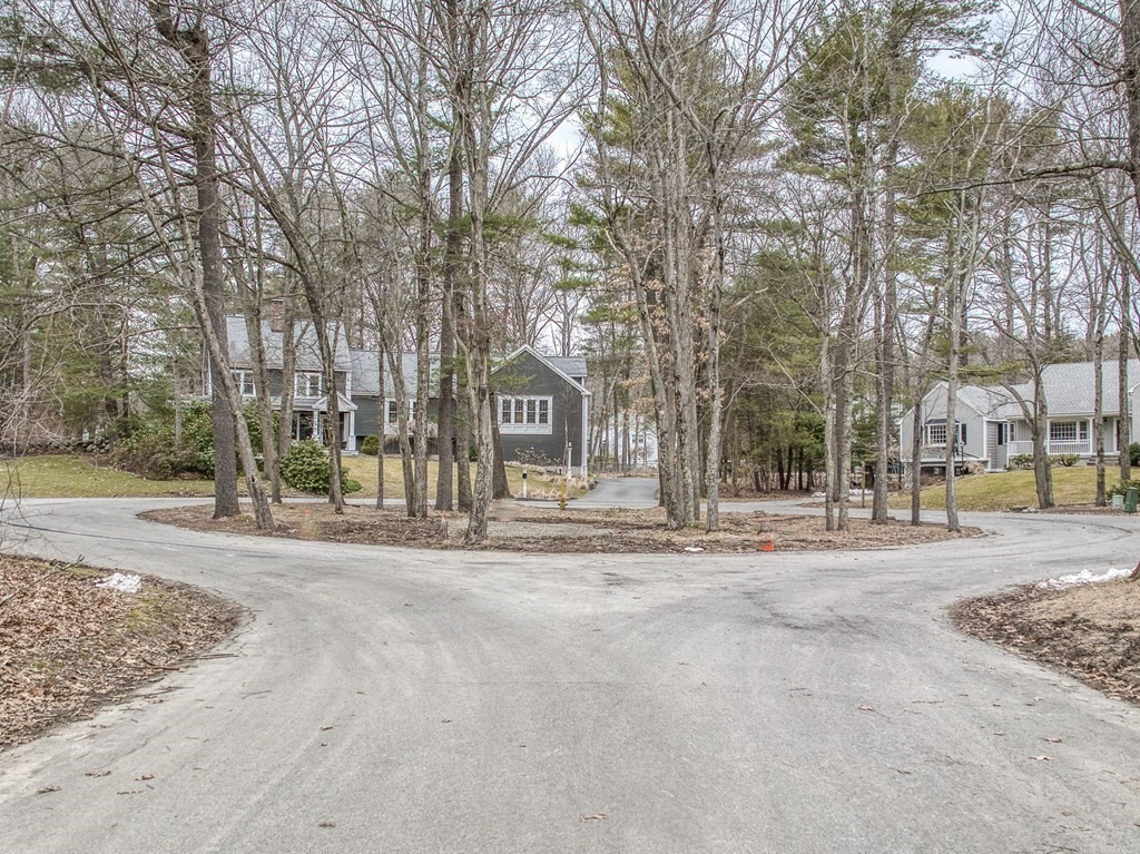 6 Phaeton Circle Andover, MA 01810 - Photo 37 of 42 front view of a house with a large trees