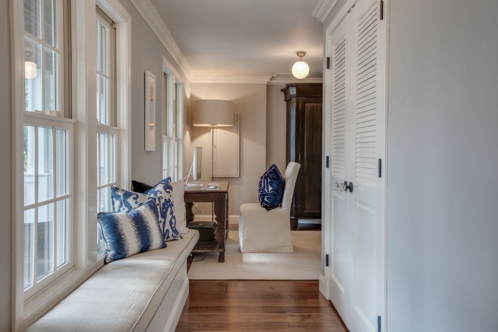 6 Phaeton Circle Andover, MA 01810 - Photo 8 of 42 a living room with furniture and a fireplace