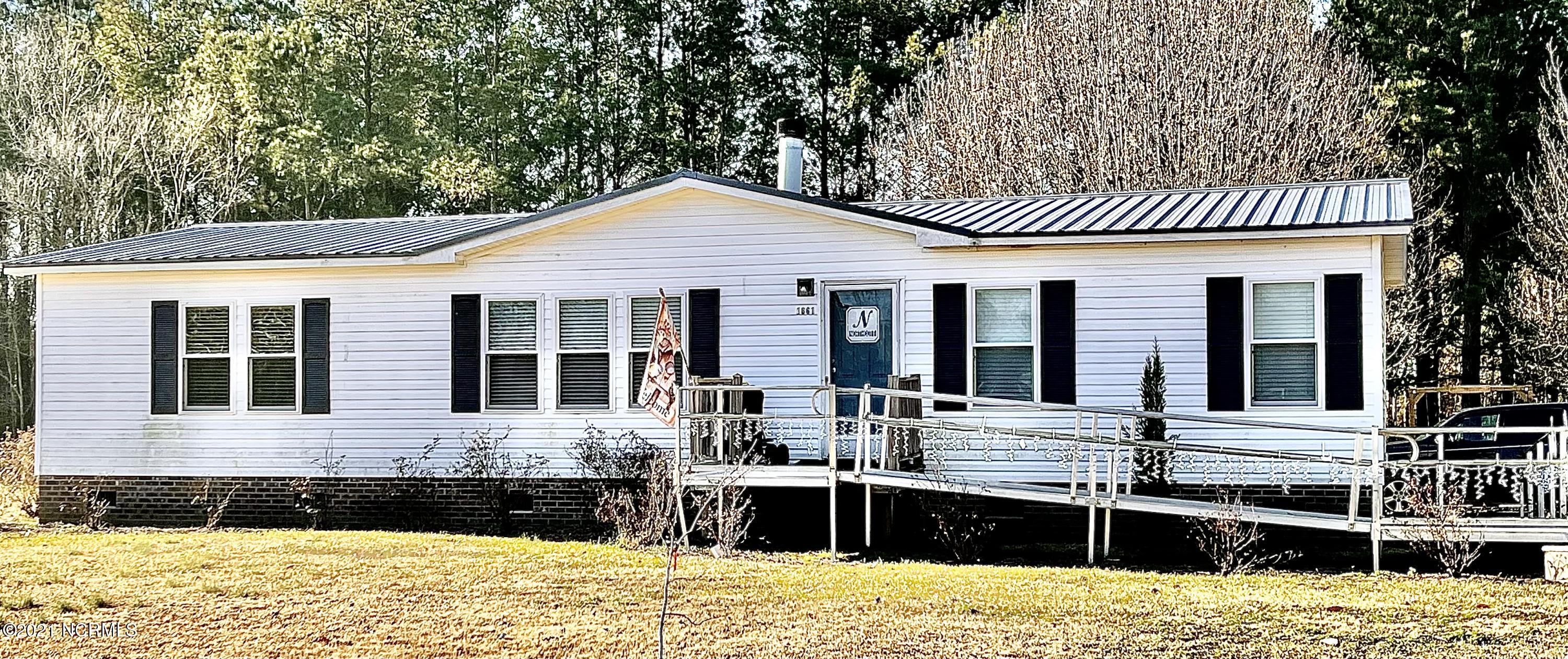 1661 Lake Road Willard, NC 28478 - Photo 1 of 32 Front of house