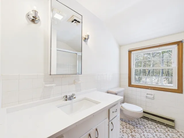 a bathroom with a sink toilet a shower and a bathtub