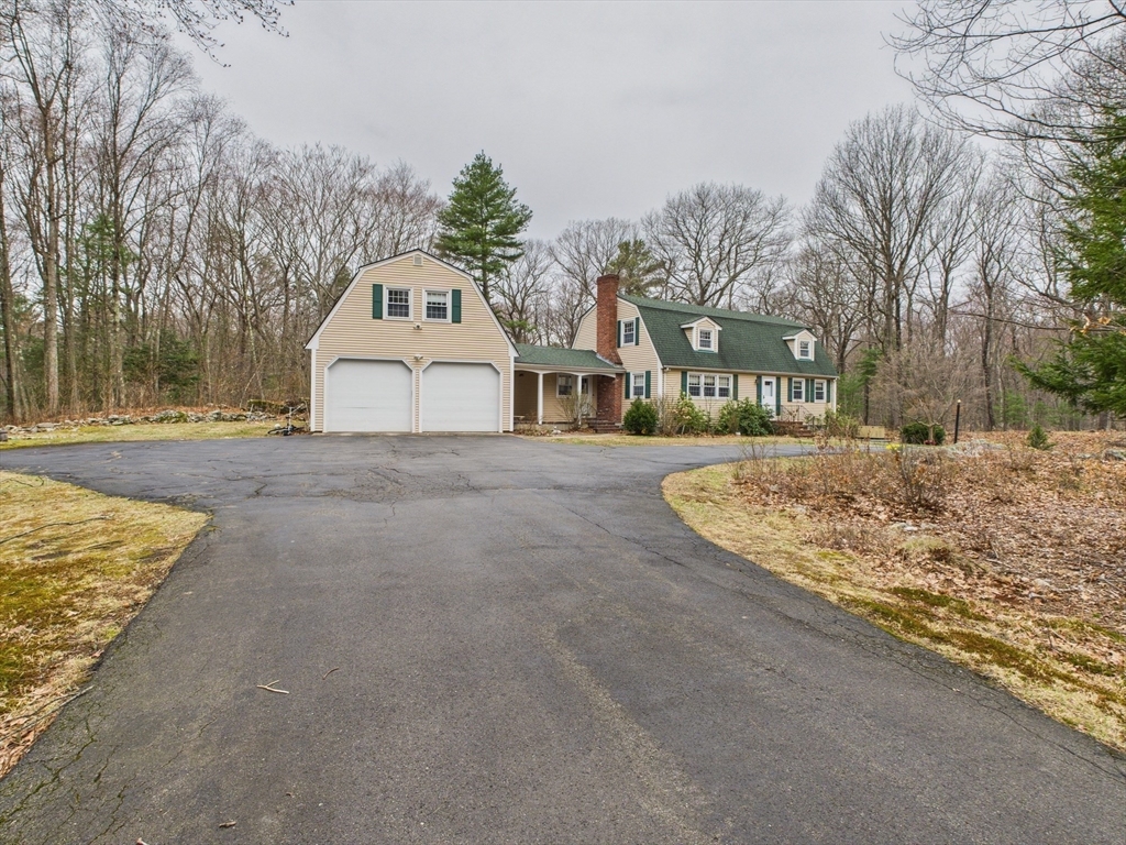215 Stoney Lea Road Dedham, MA 02026 - Photo 26 of 27 a view of white house with a yard