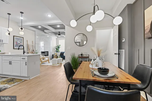 a kitchen with a table and a stove