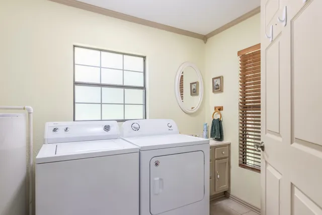 a utility room with dryer and washer