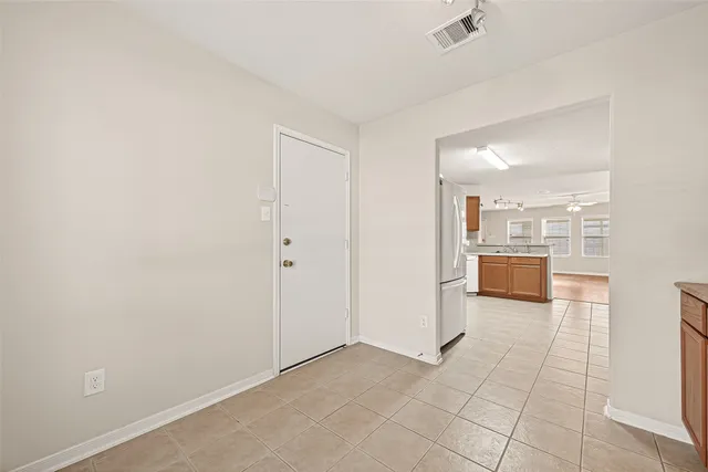 a view of a kitchen with a sink