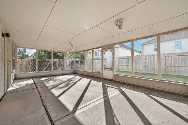 a view of a large room with a large window