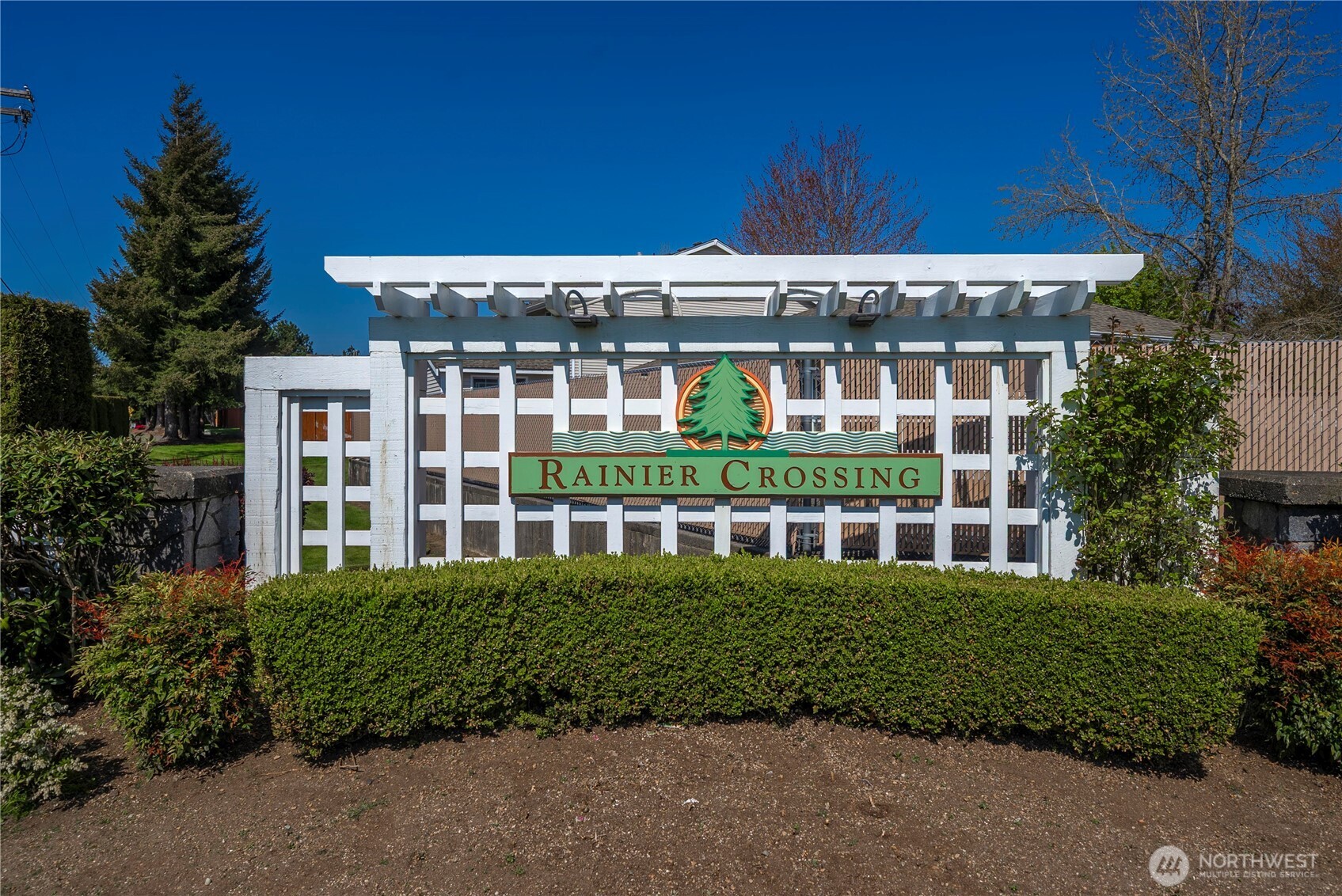6611 Millstone Lane Southeast, Unit F101 Lacey, WA 98513 - Photo 2 of 40 a front view of a building with a garden