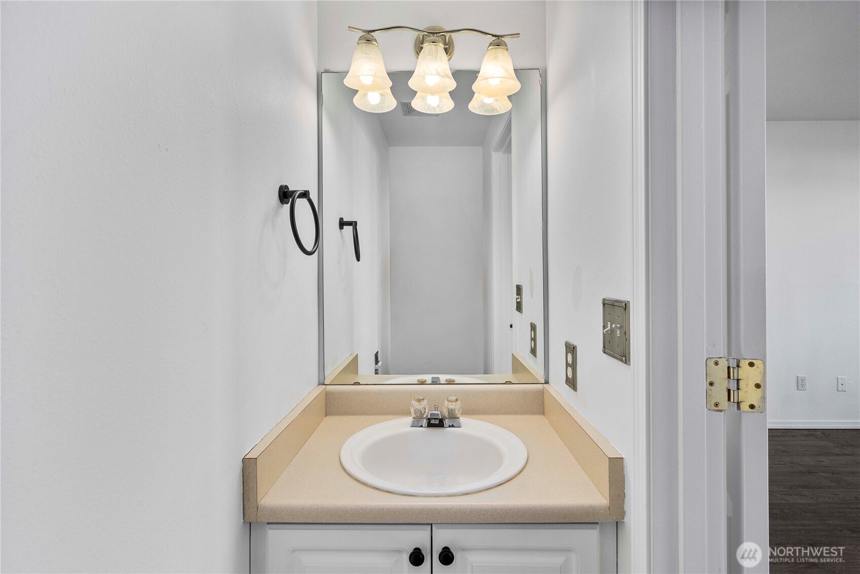 6611 Millstone Lane Southeast, Unit F101 Lacey, WA 98513 - Photo 24 of 40 a bathroom with a sink and a mirror