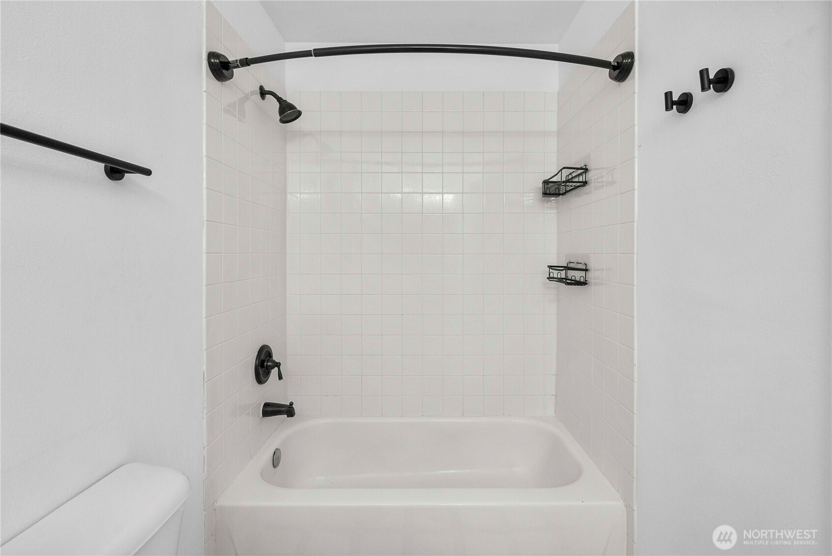 6611 Millstone Lane Southeast, Unit F101 Lacey, WA 98513 - Photo 31 of 40 a bathroom with a shower and a bath tub