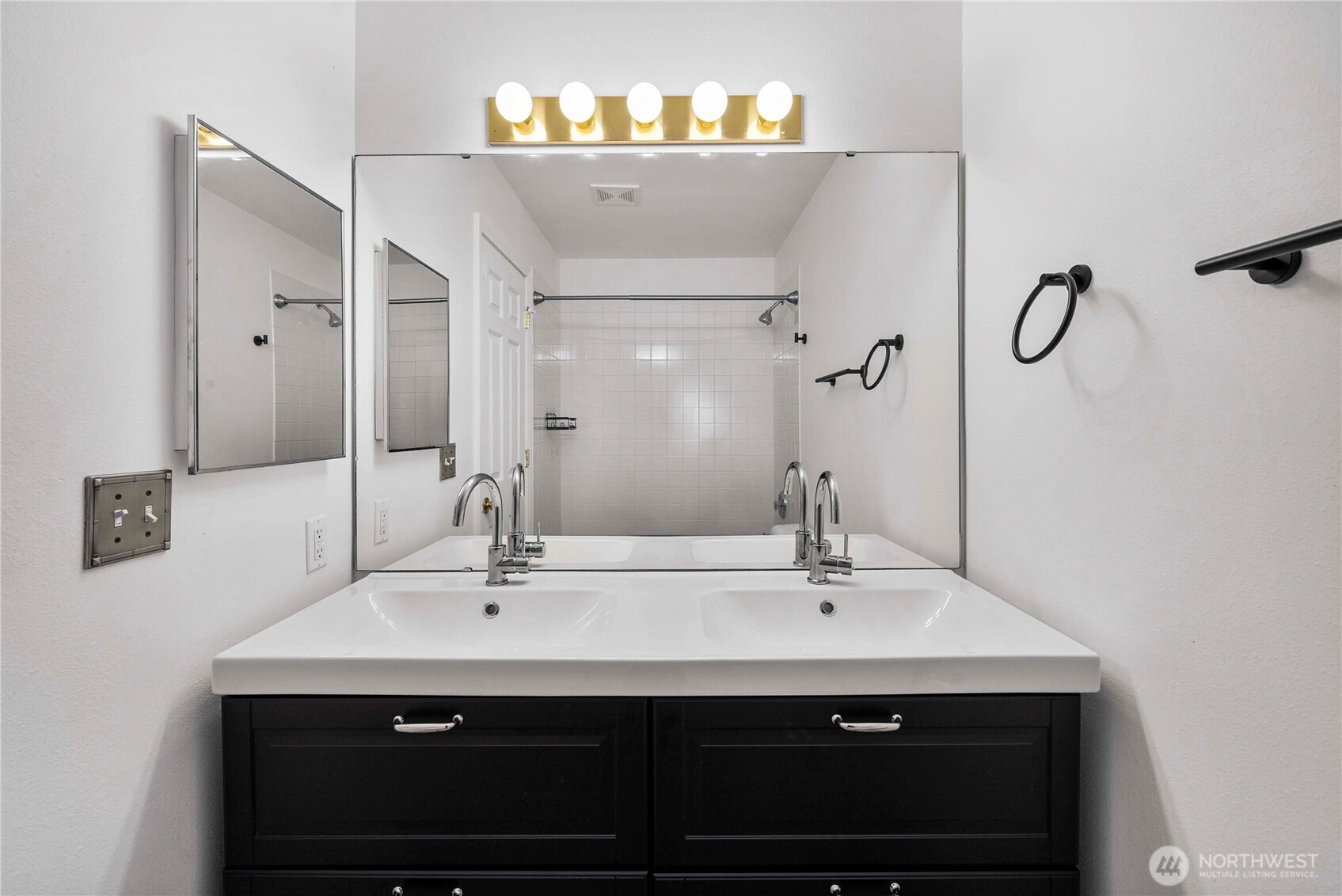 6611 Millstone Lane Southeast, Unit F101 Lacey, WA 98513 - Photo 32 of 40 a bathroom with a sink and a mirror