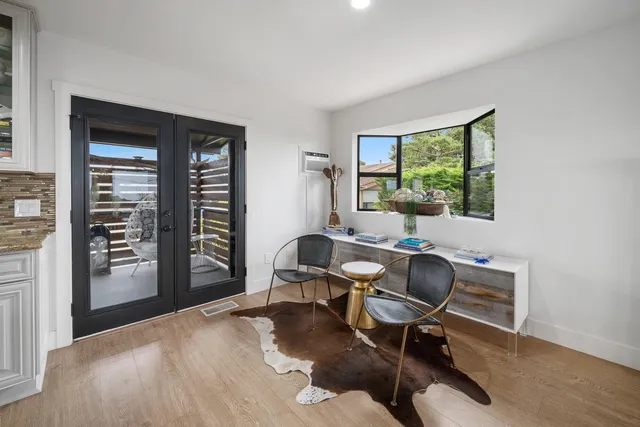 a workspace with furniture and a window