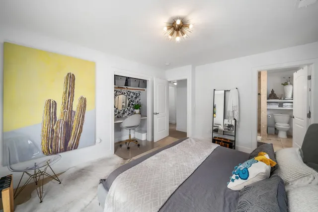 a bedroom with furniture and a view of bedroom