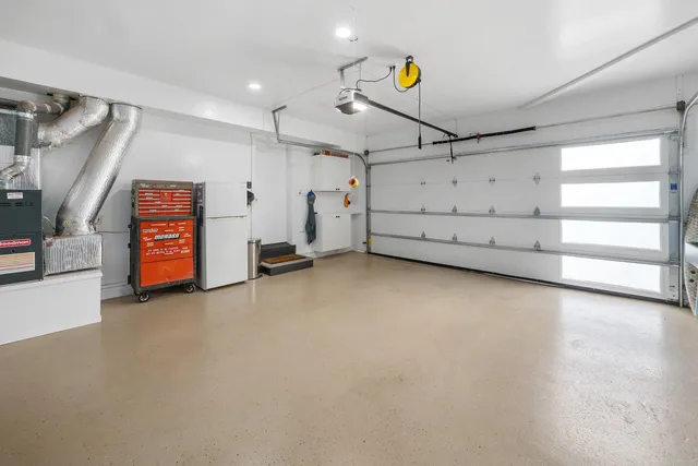 a view of a livingroom with wooden furniture