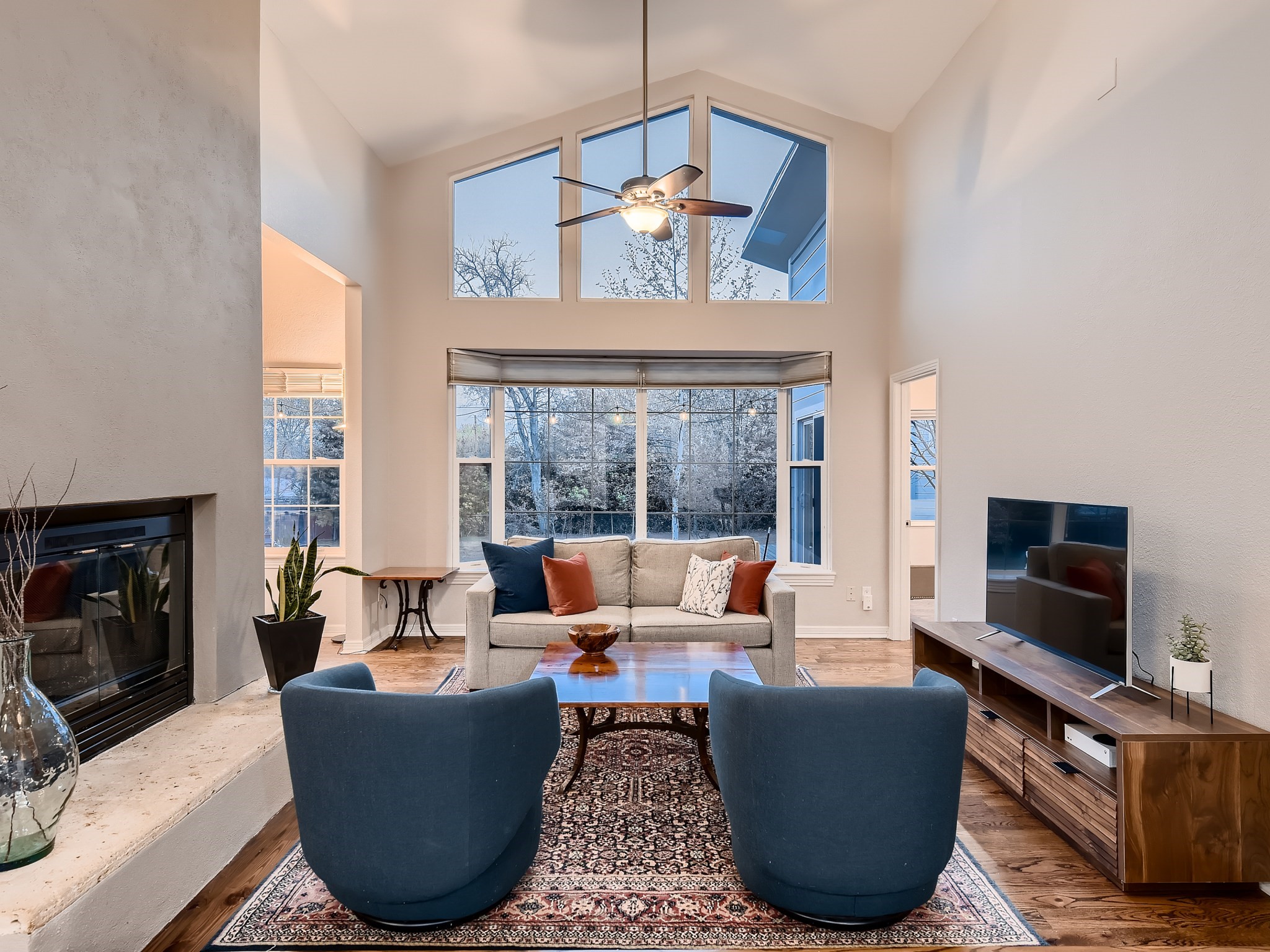 4905 Bull Creek Road Austin, TX 78731 - Photo 1 of 1 Floor to extra high ceiling windows open house up to the large backyard.