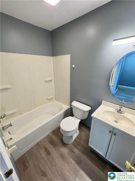 1905 South Law Street Allentown, PA 18103 - Photo 14 of 18 a bathroom with a sink a toilet and bathtub