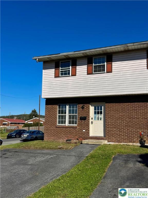 1905 South Law Street Allentown, PA 18103 - Photo 2 of 18 a front view of a house with a garden