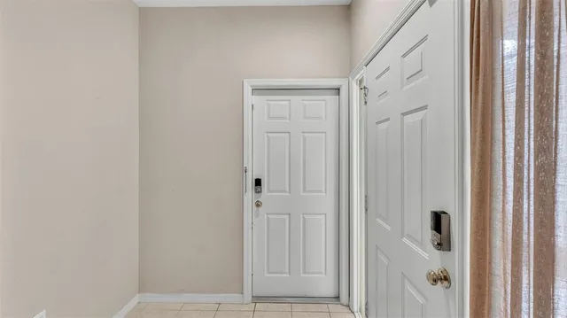 a bathroom with a shower and a sink