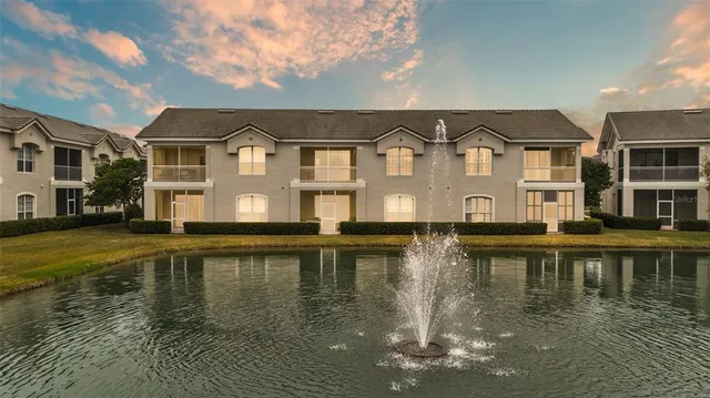 a view of a lake with a building in the background