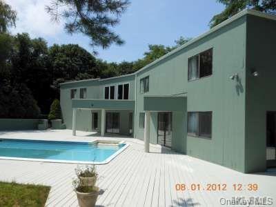 143 Sebonac Road Southampton, NY 11968 - Photo 1 of 1 a view of a house with a swimming pool