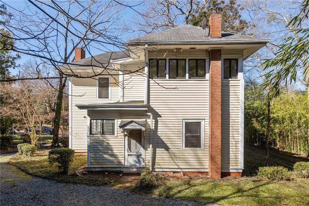 120 South Candler Street Decatur, GA 30030 - Photo 3 of 40 a view of a house with a yard