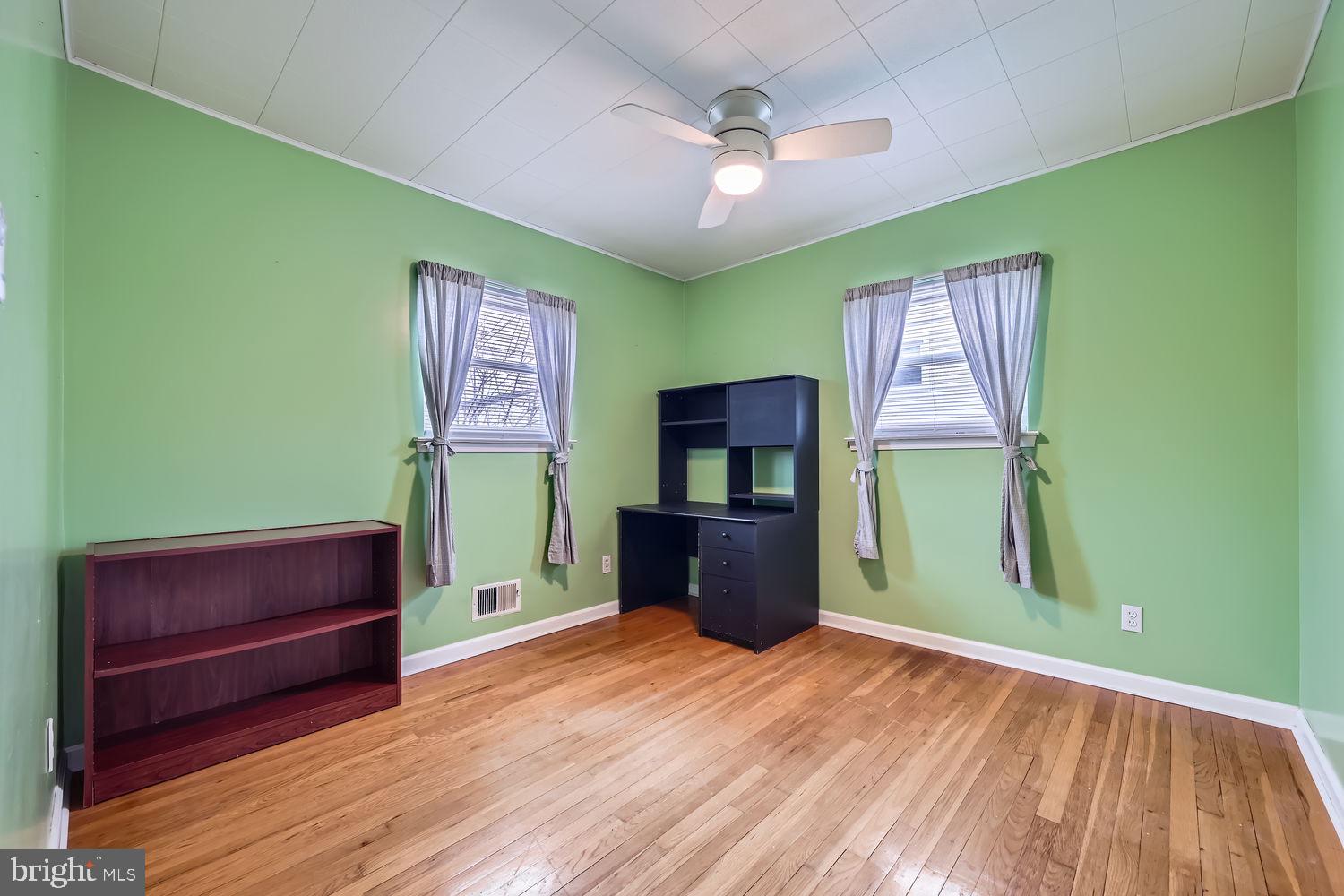 407 Brownell Road Middle River, MD 21220 - Photo 17 of 28 a view of a room with window and wooden floor