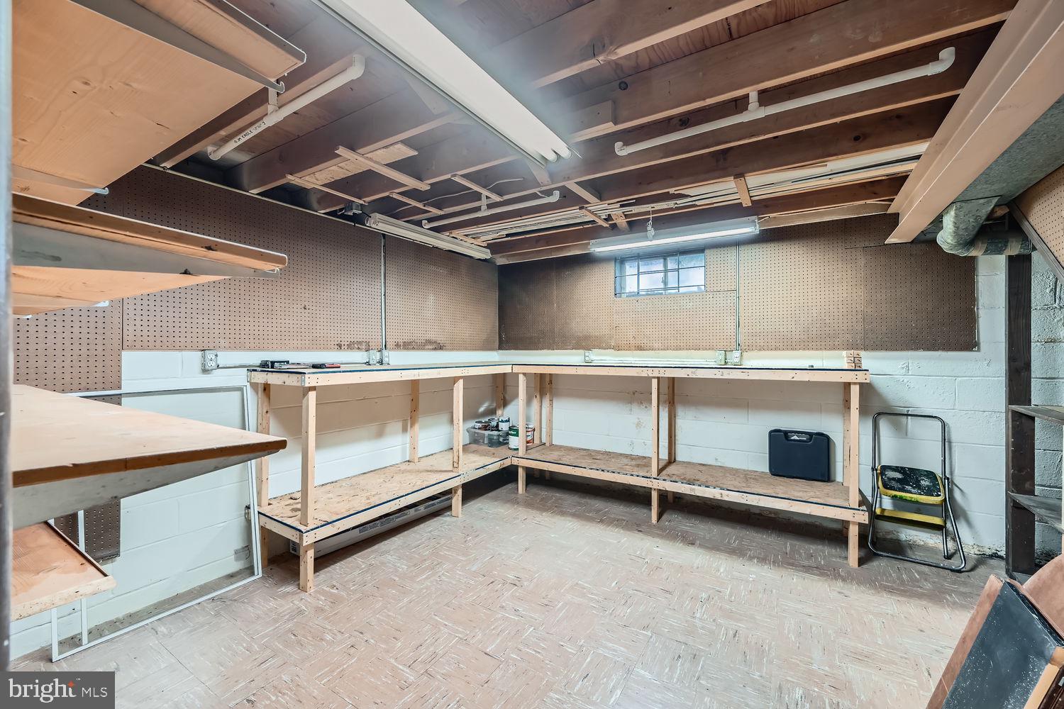 407 Brownell Road Middle River, MD 21220 - Photo 21 of 28 a view of an empty room with racks