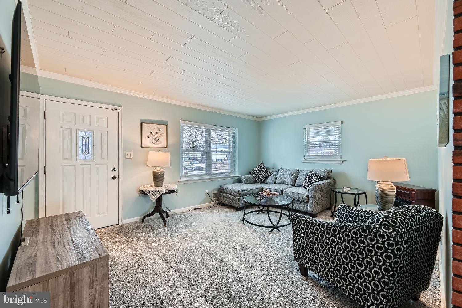 407 Brownell Road Middle River, MD 21220 - Photo 5 of 28 a living room with furniture rug and wooden floor