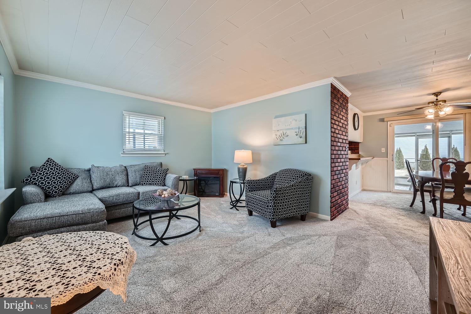 407 Brownell Road Middle River, MD 21220 - Photo 6 of 28 a living room with furniture lamp and a window