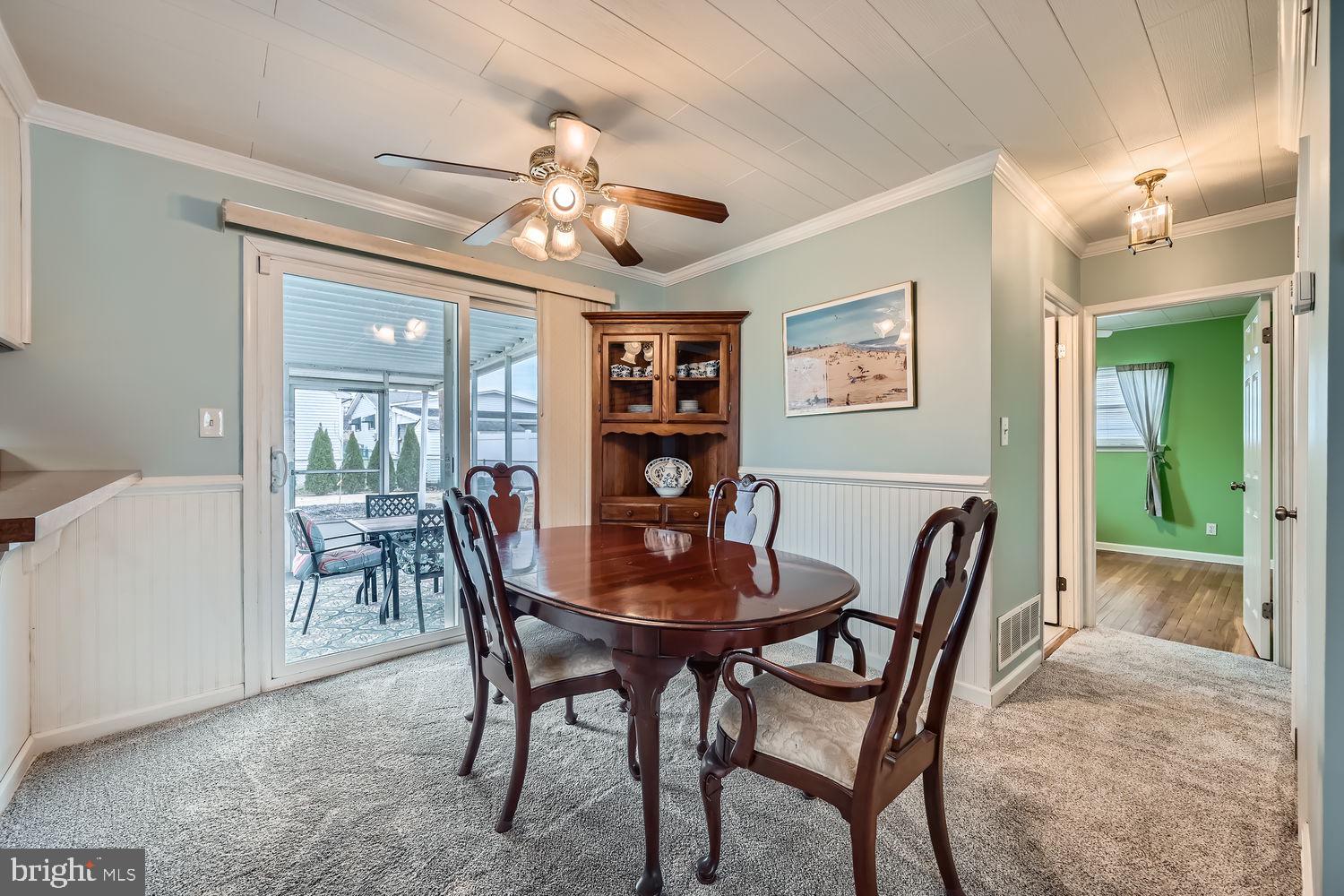 407 Brownell Road Middle River, MD 21220 - Photo 8 of 28 a view of a dining room with furniture and a chandelier