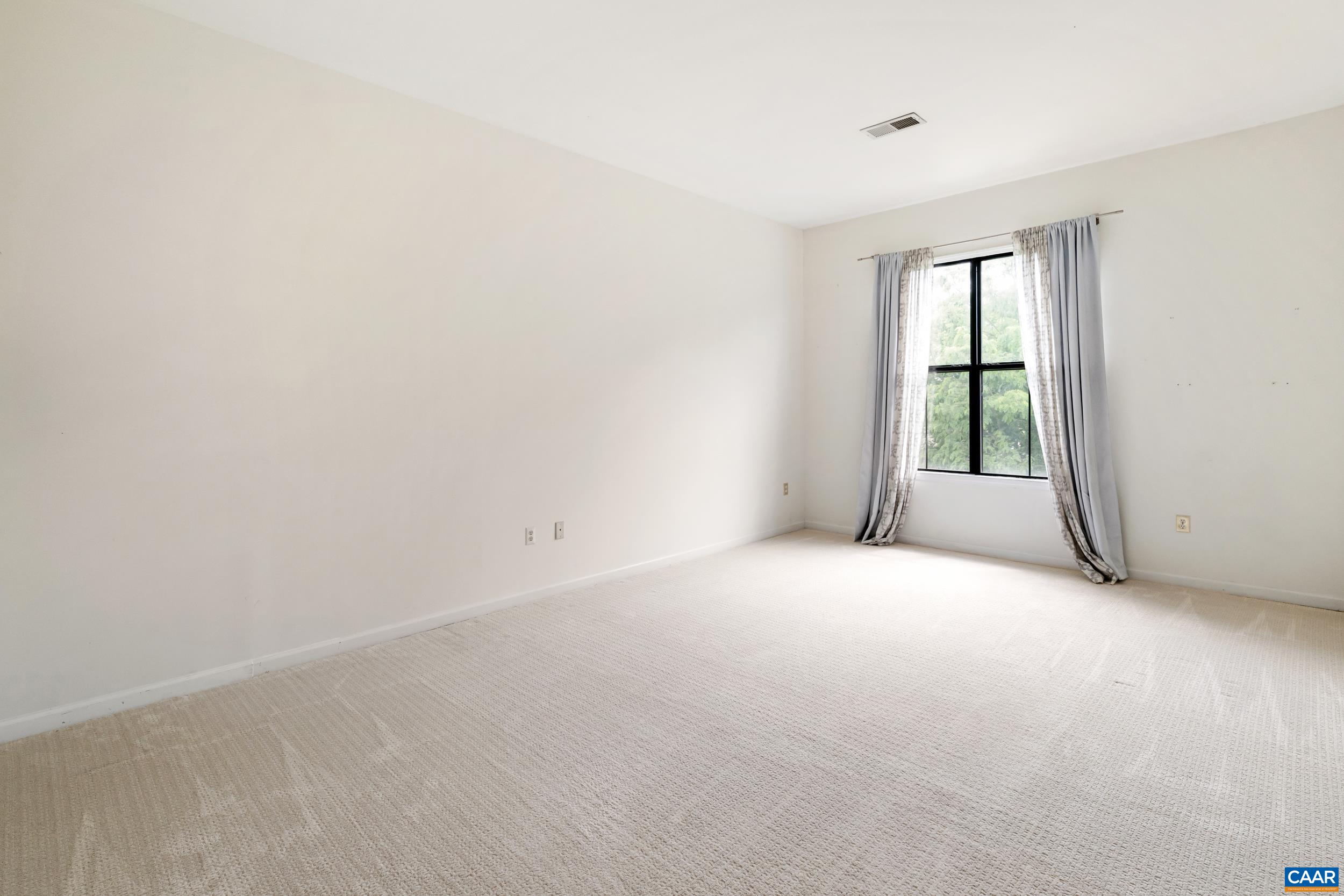 760 Walker Square, Unit 4B Charlottesville, VA 22903 - Photo 11 of 40 an empty room with windows