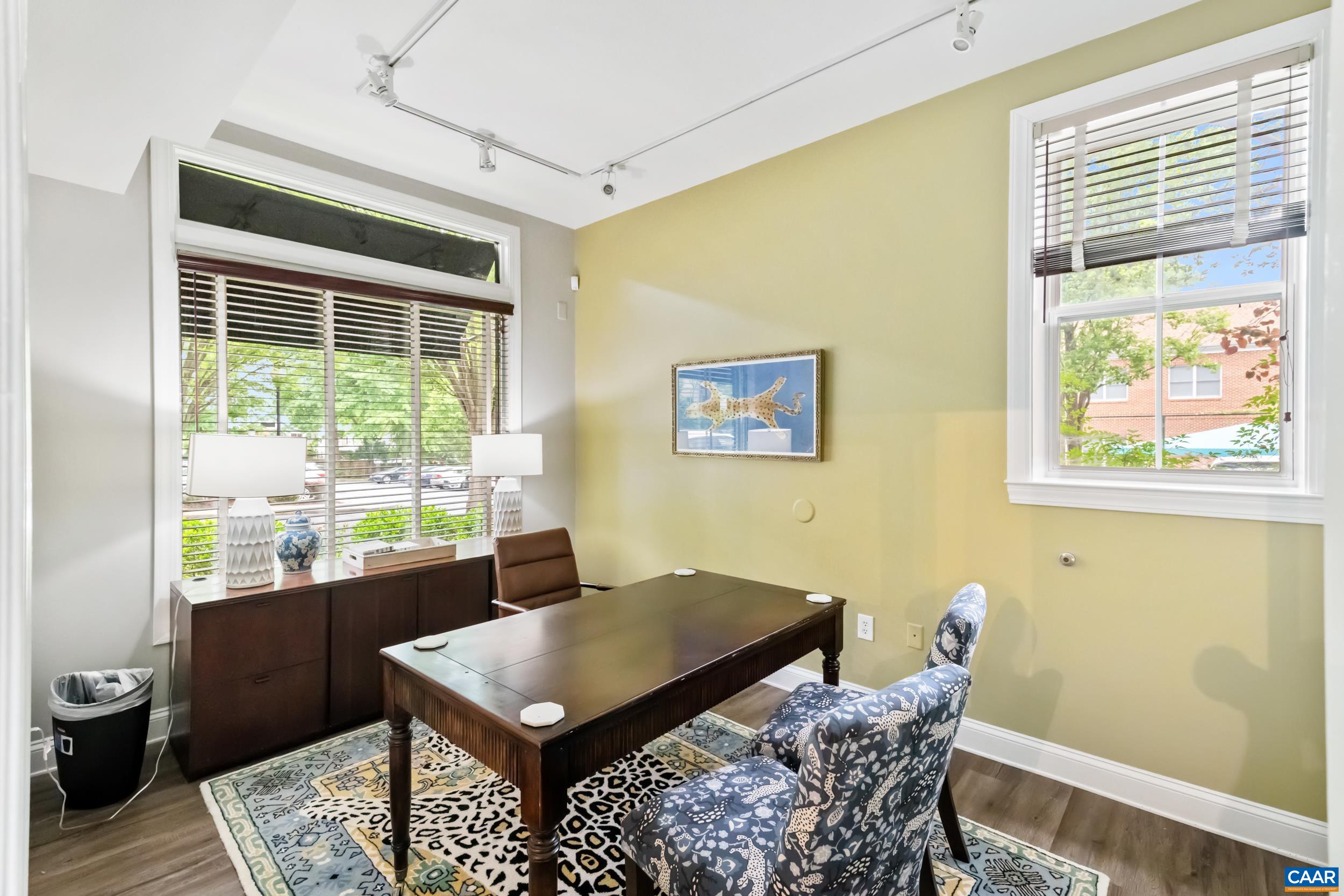 760 Walker Square, Unit 4B Charlottesville, VA 22903 - Photo 28 of 40 a view of a workspace with furniture and a window