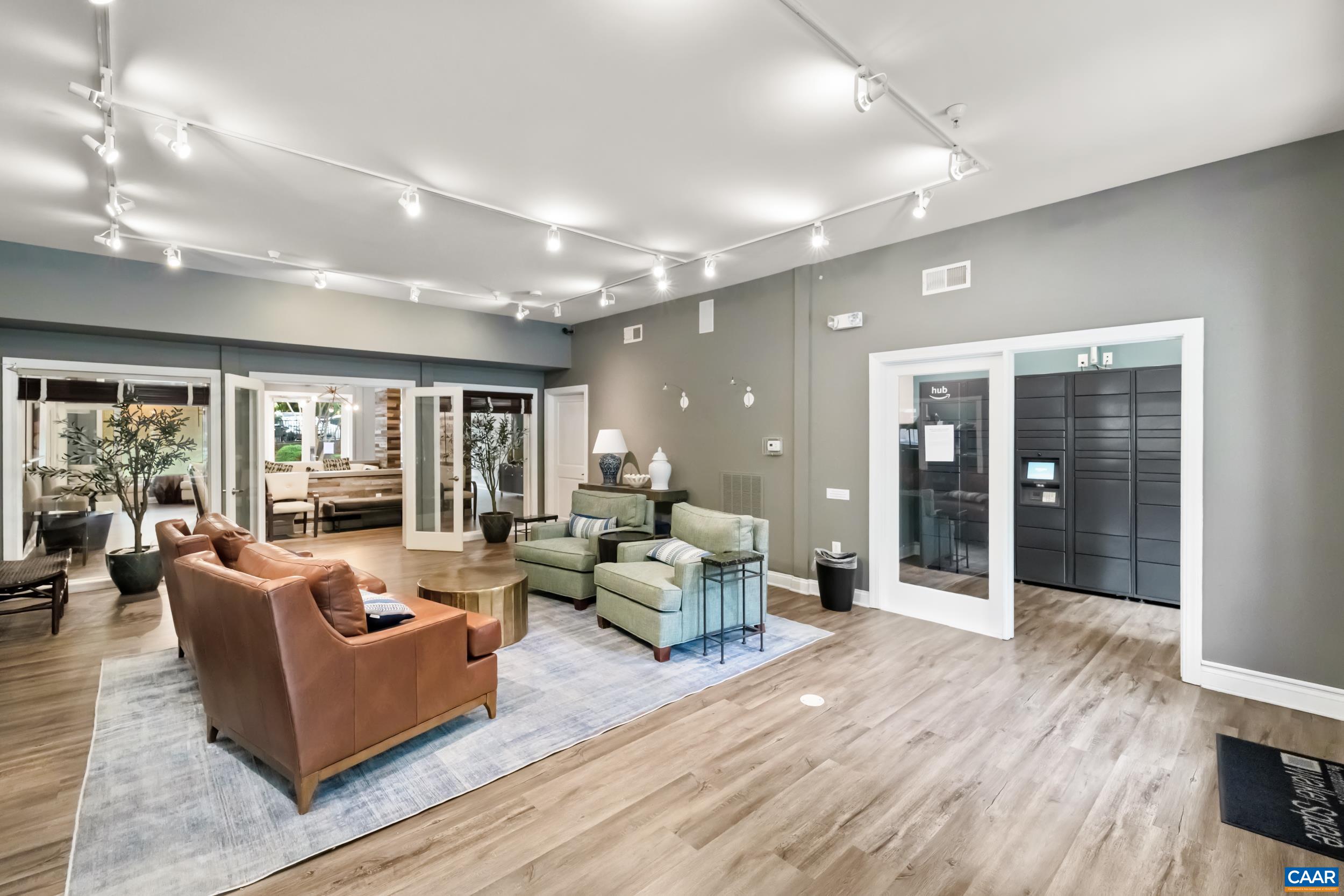 760 Walker Square, Unit 4B Charlottesville, VA 22903 - Photo 29 of 40 a living room with furniture and large windows