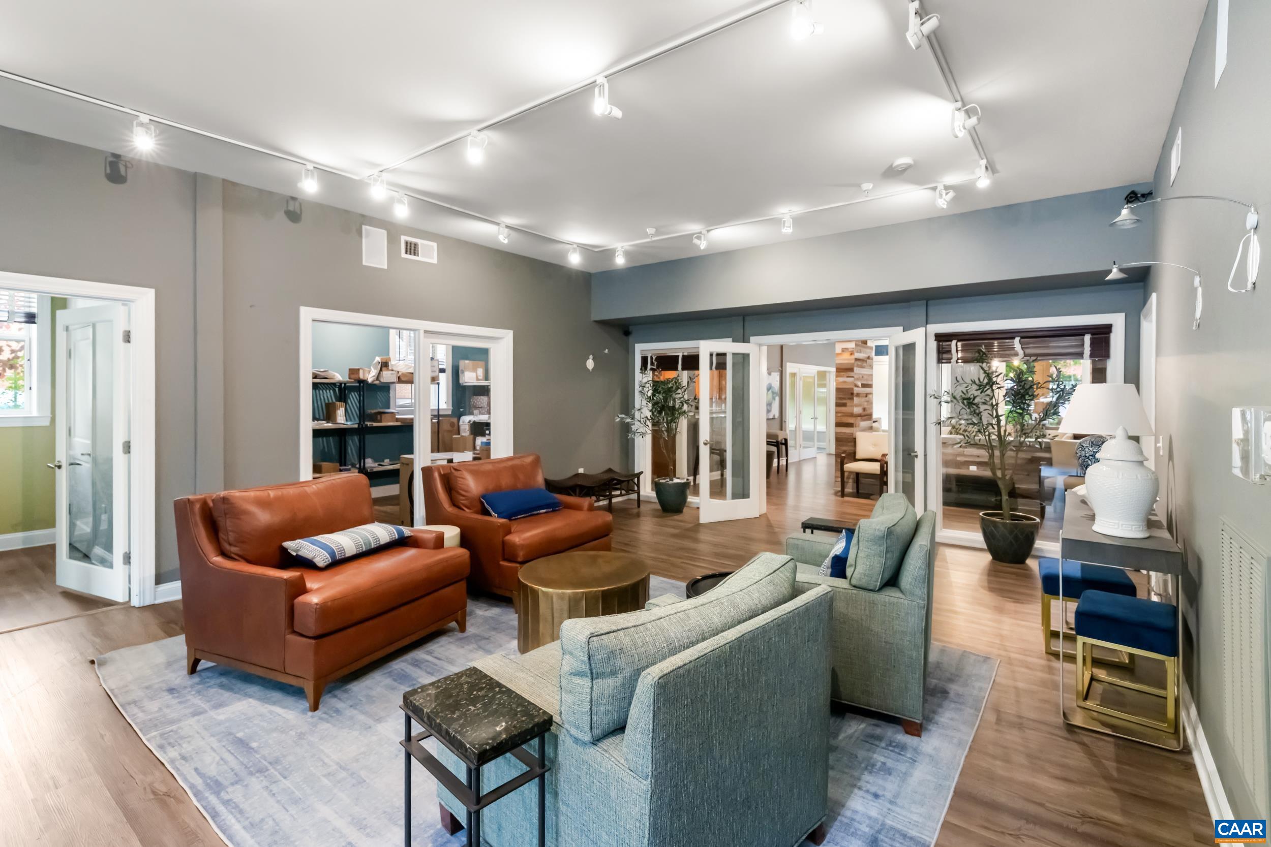 760 Walker Square, Unit 4B Charlottesville, VA 22903 - Photo 30 of 40 a living room with furniture and a large window