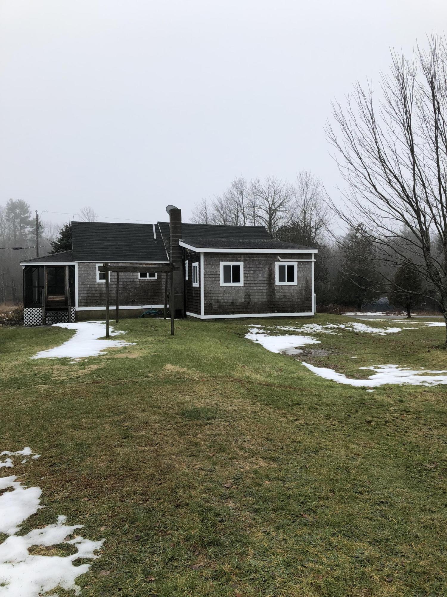 190 Priest Road Northport, ME 04849 - Photo 2 of 14 Rear view of home from pasture.