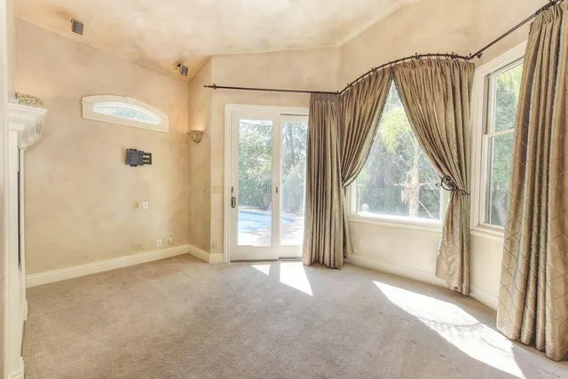 a view of a room with a large window