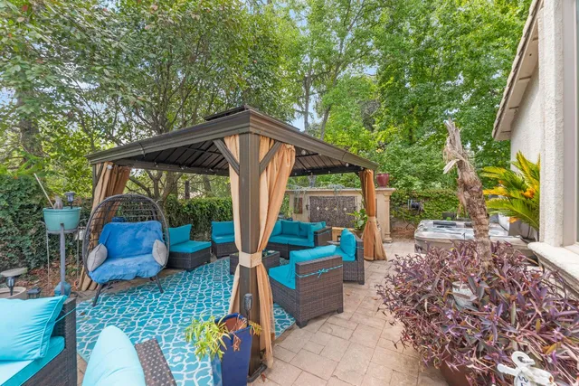 a backyard of a house with seating space