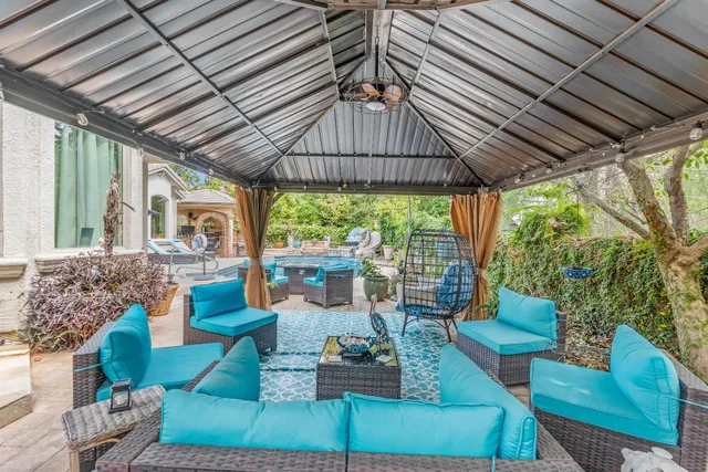 a outdoor space with patio lots of furniture