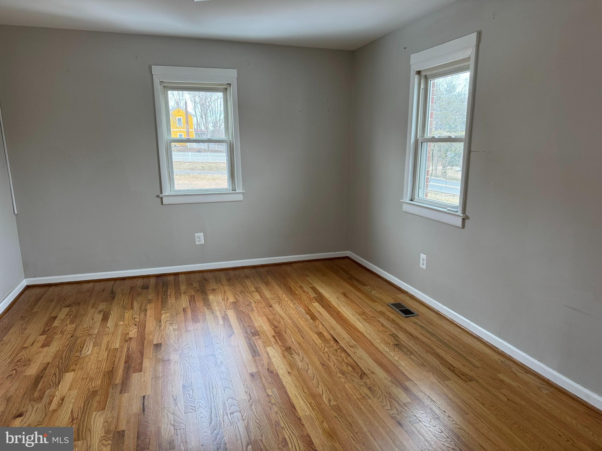 10012 Ellis Road Manassas, VA 20111 - Photo 13 of 71 a view of a room with wooden floor and window