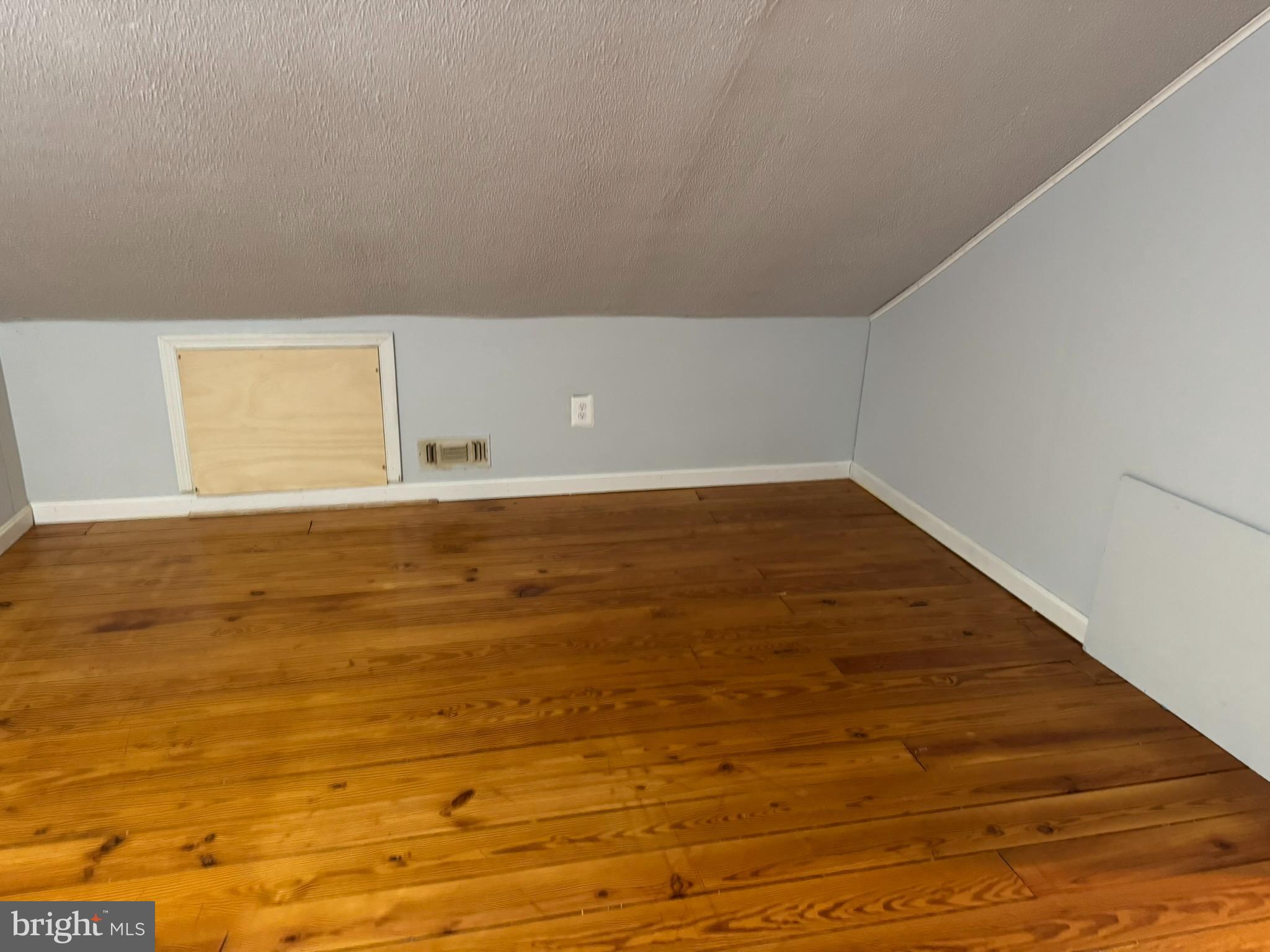 10012 Ellis Road Manassas, VA 20111 - Photo 30 of 71 a view of empty room with wooden floor