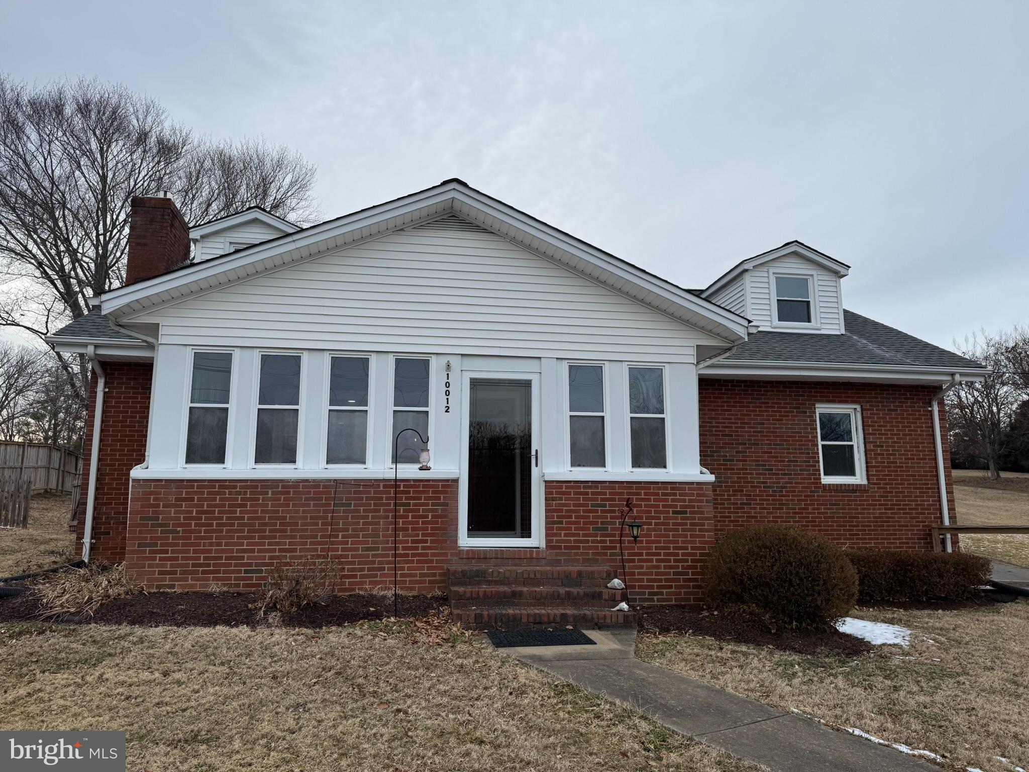 10012 Ellis Road Manassas, VA 20111 - Photo 42 of 71 a front view of a house with a yard