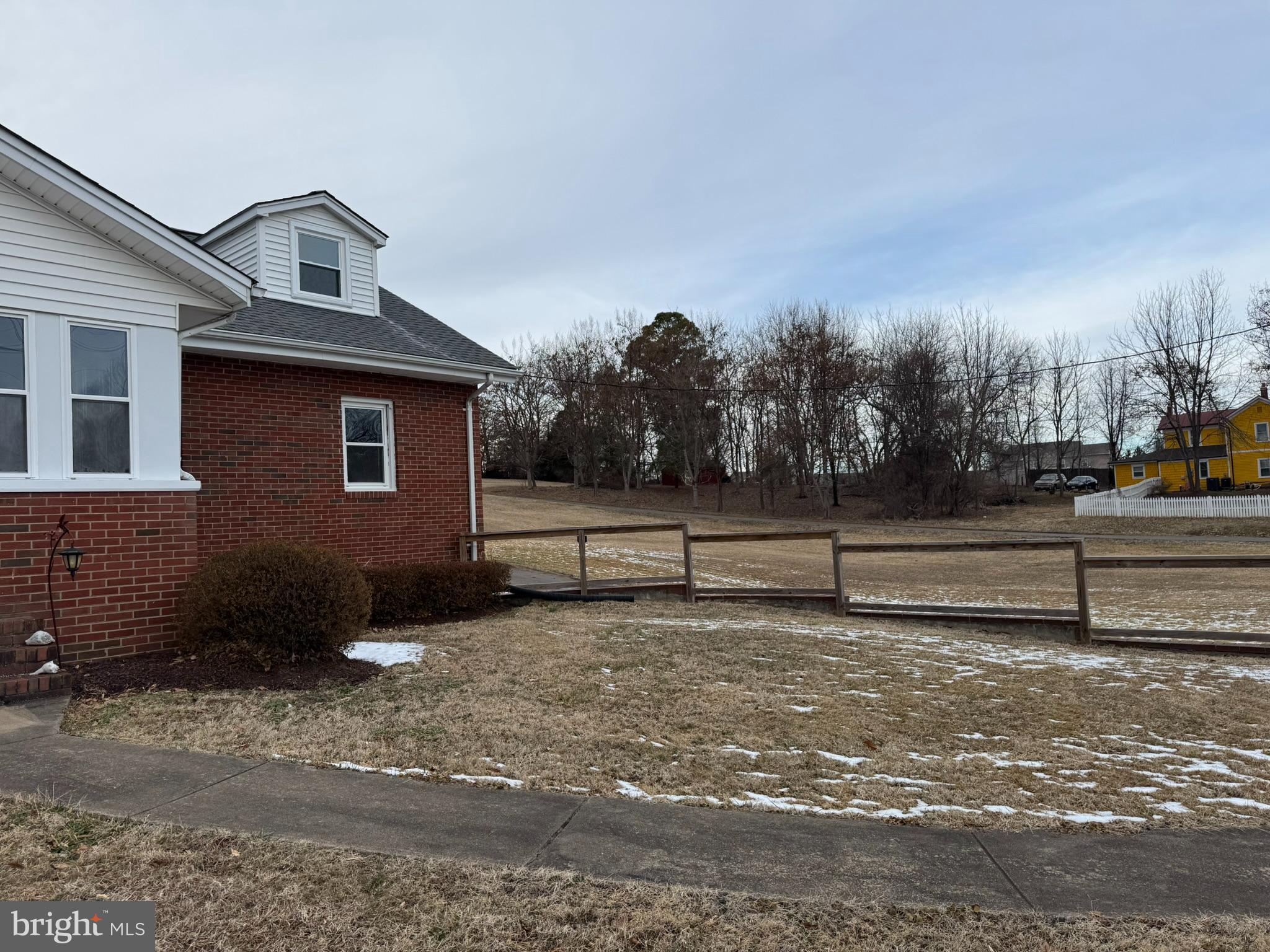 10012 Ellis Road Manassas, VA 20111 - Photo 43 of 71 a front view of a house with trees