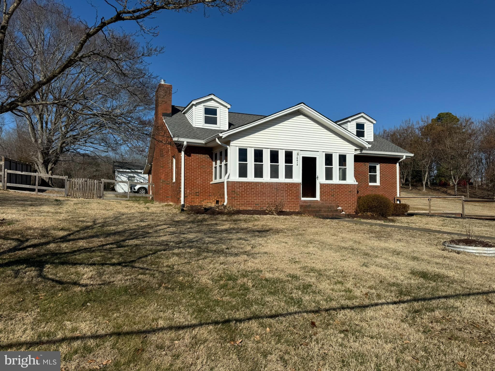 10012 Ellis Road Manassas, VA 20111 - Photo 55 of 71 a front view of a house with a yard