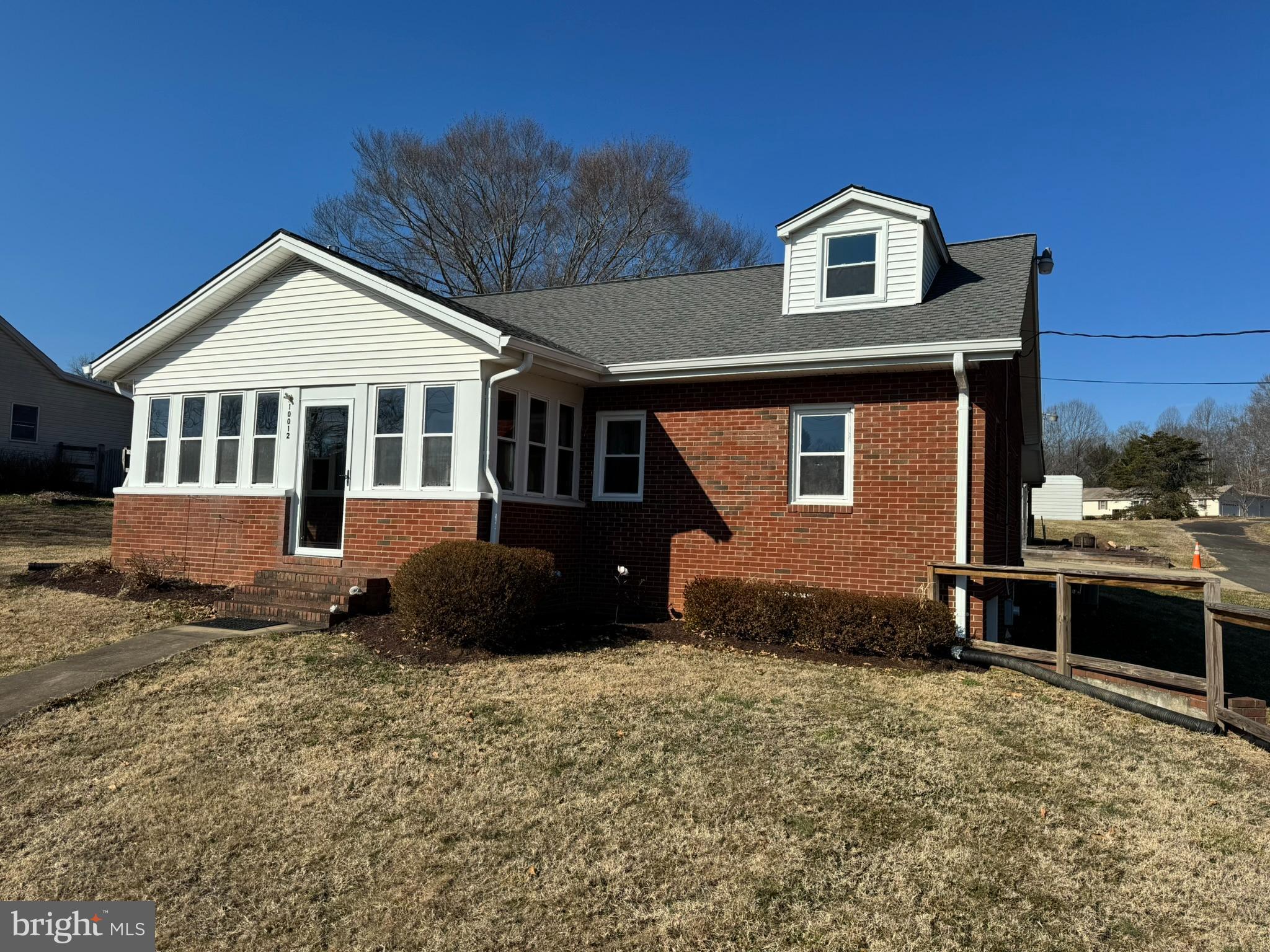 10012 Ellis Road Manassas, VA 20111 - Photo 56 of 71 a front view of a house with a yard
