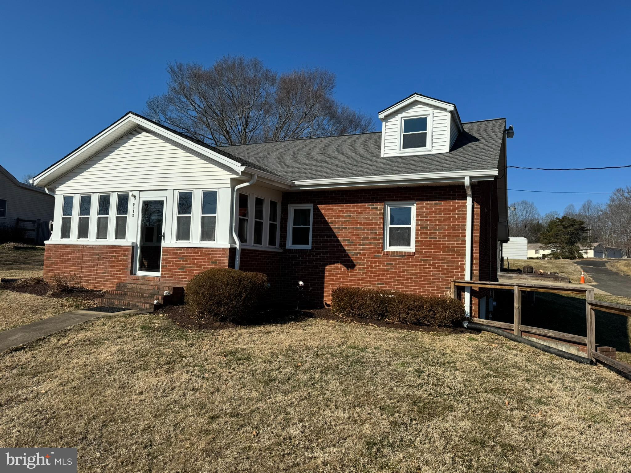10012 Ellis Road Manassas, VA 20111 - Photo 57 of 71 a front view of a house with a yard
